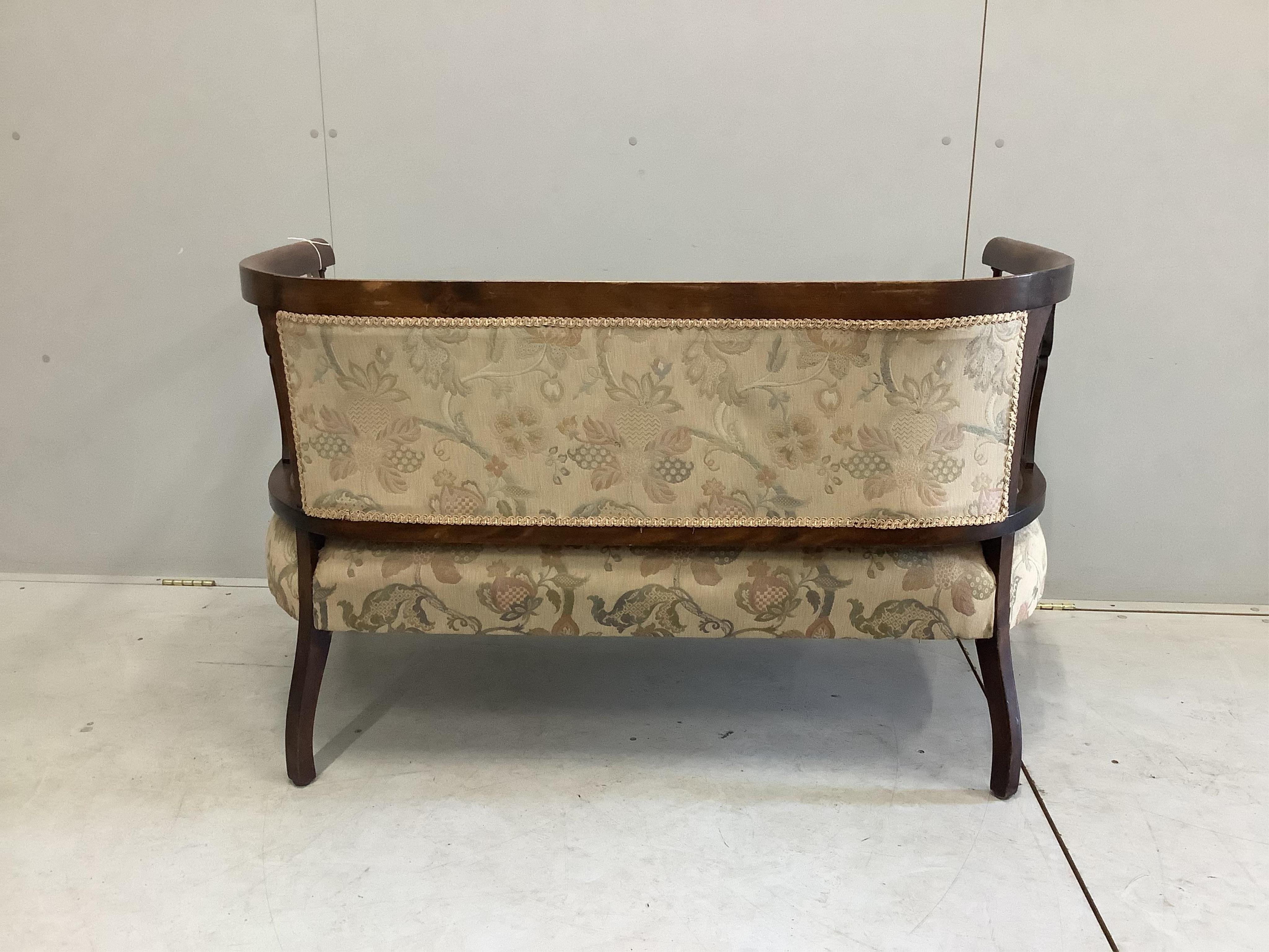 An Edwardian stained beech settee, width 122cm, height 73cm. Condition - fair